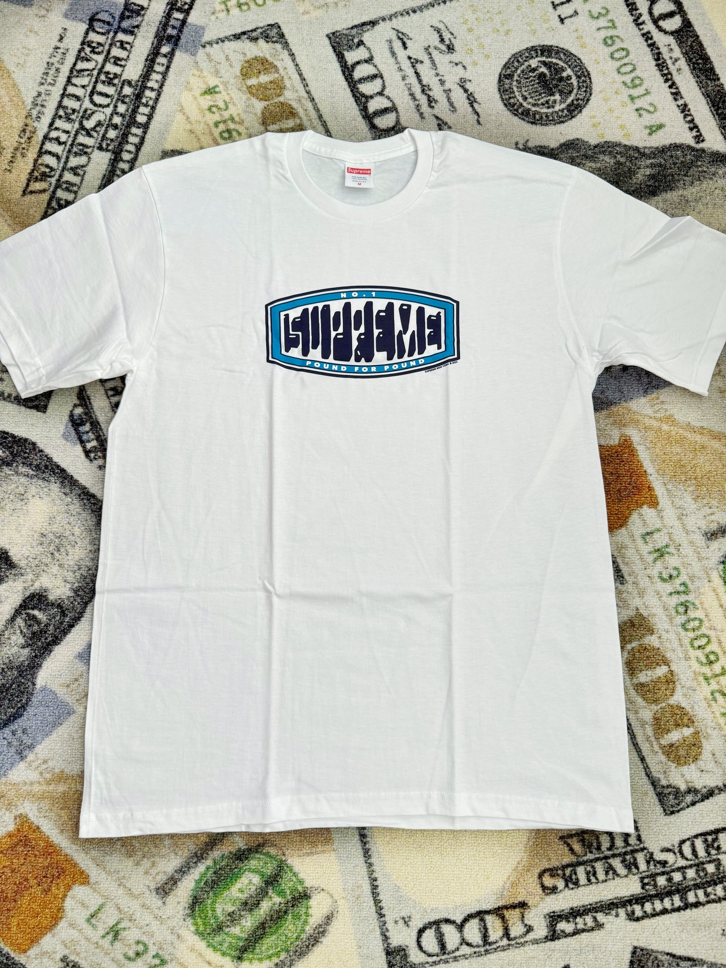 Supreme Pound Tee – White (FW23)