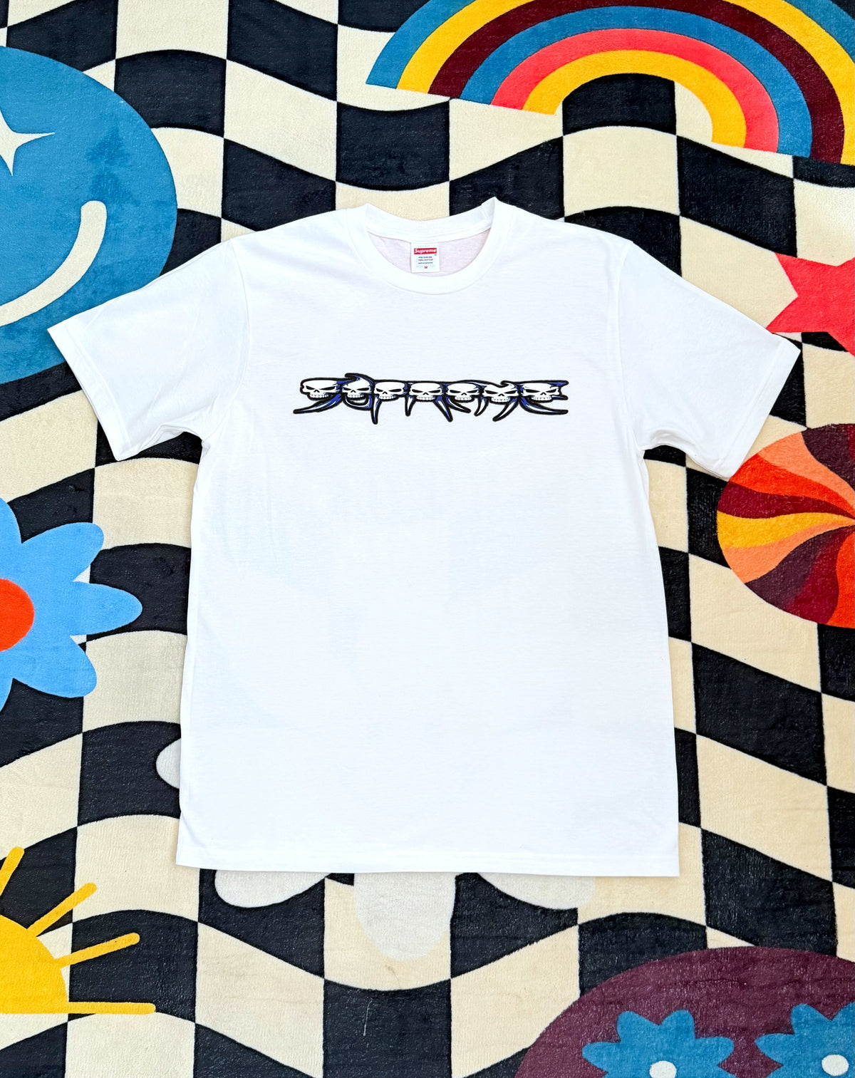Supreme Skulls Spellout Tee – White